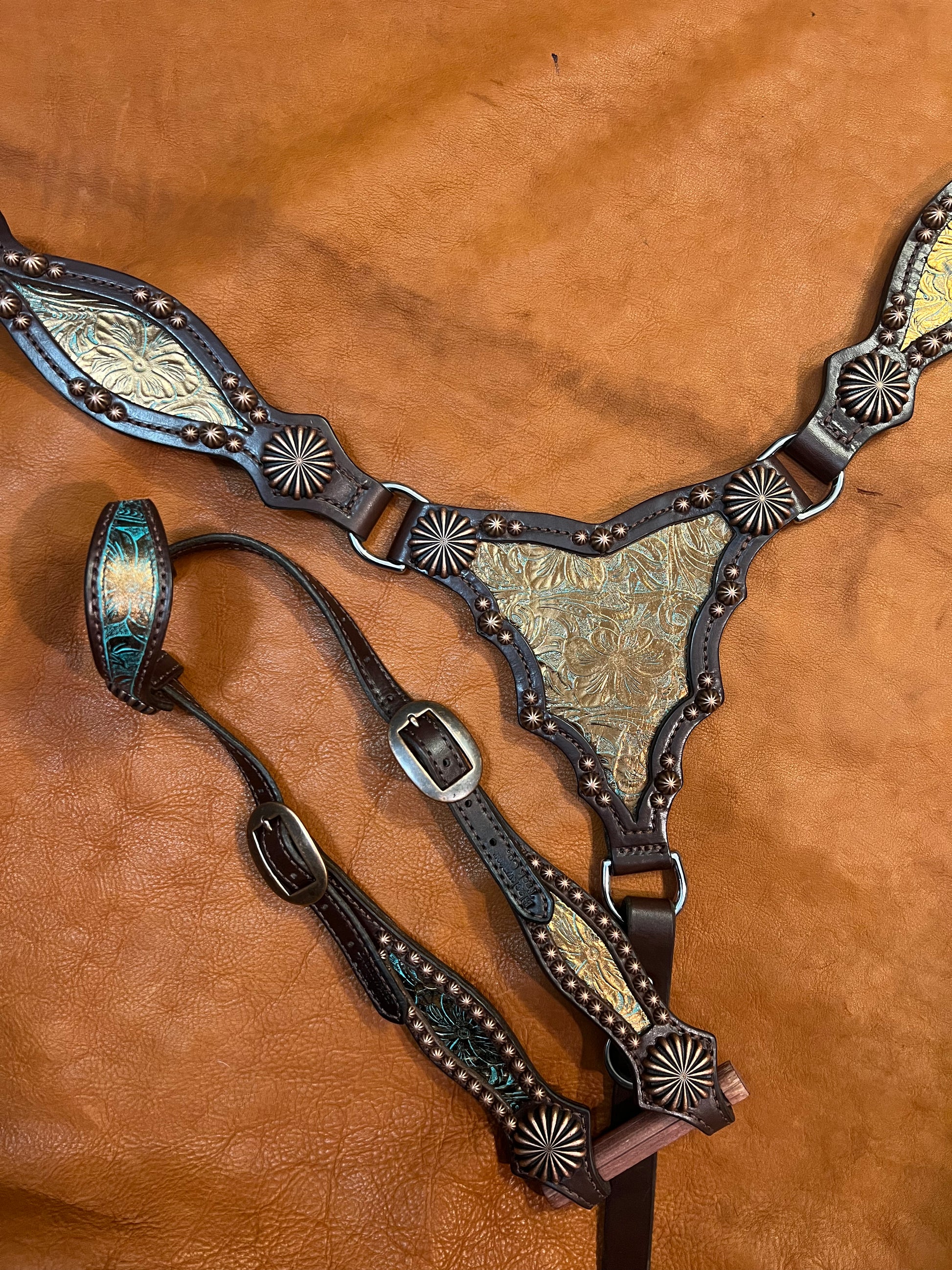 a bronze and turquoise gladiator style breast collar and one-ear headstall