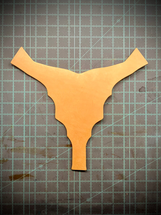 A leather gladiator style center plate blank.