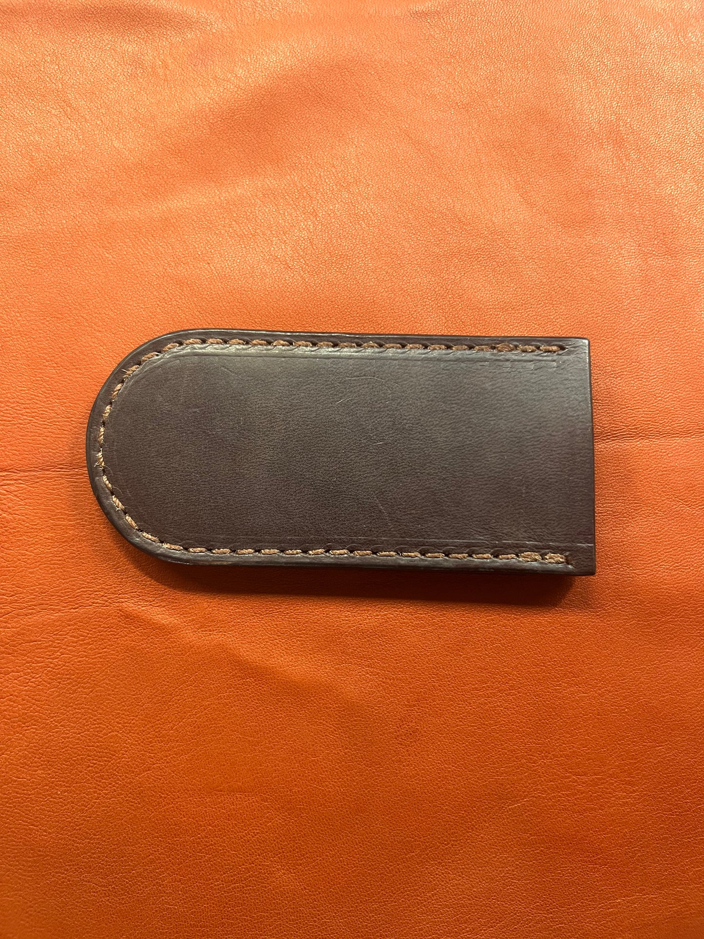 a brown cast iron skillet handle cover